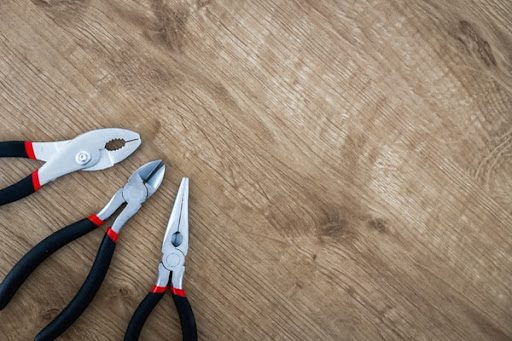 Common household tools on a table.