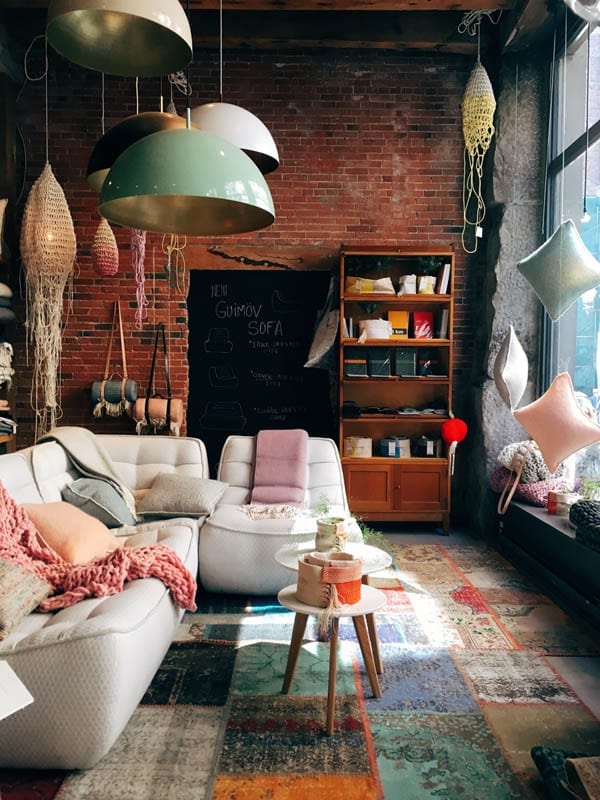 A Stylish loft apartment living room with bohemian style and decorations.