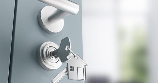 A key is inserted into a doorlock.